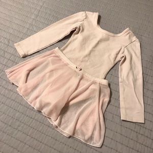 Pink ballet leotard and tutu